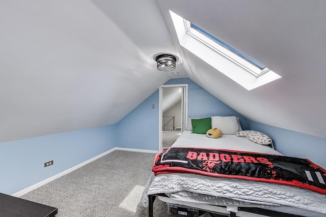 1325 Lincoln St, North Chicago, IL 60064 - carpeted bedroom with a skylight, lofted ceiling, and baseboards