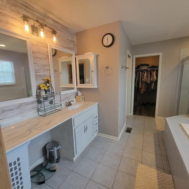 21526 Trick Circle Ct, Wilmington, IL 60481 - full bath featuring tile patterned floors, a walk in closet, vanity, walk in shower, and visible vents