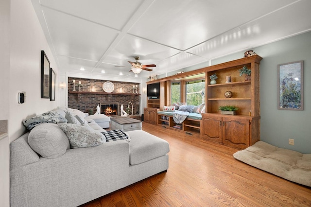 41W838 High Point Ln, Elburn, IL 60119 - living room featuring a brick fireplace, ceiling fan, wood finished floors, coffered ceiling, and recessed lighting