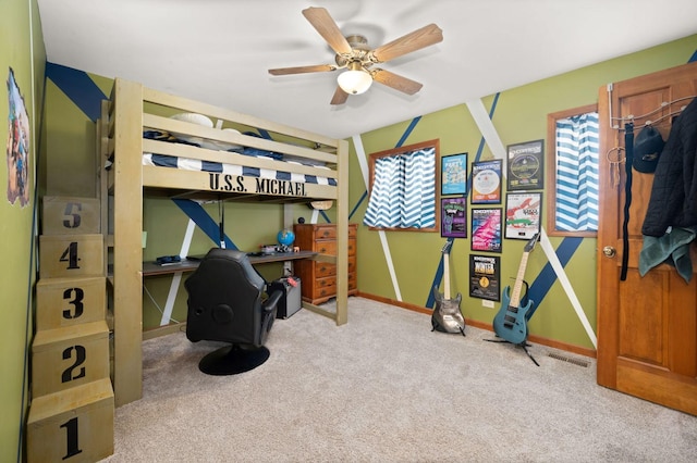 41W838 High Point Ln, Elburn, IL 60119 - carpeted bedroom with multiple windows, baseboards, a desk, and a ceiling fan