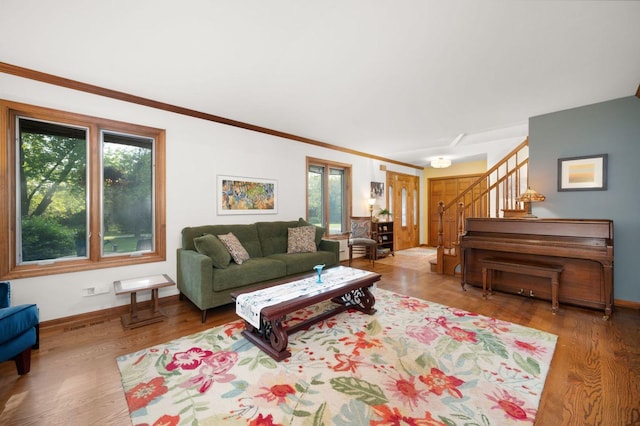 41W838 High Point Ln, Elburn, IL 60119 - living area with wood finished floors, stairs, ornamental molding, and baseboards