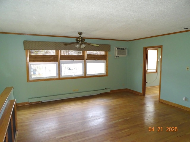 5837 N Navarre Ave, Chicago, IL 60631 - spare room featuring a baseboard radiator, a ceiling fan, crown molding, light wood-type flooring, and a textured ceiling
