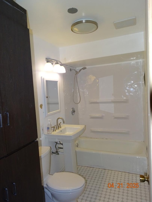 5837 N Navarre Ave, Chicago, IL 60631 - below grade area with radiator, tile patterned floors, and a drop ceiling