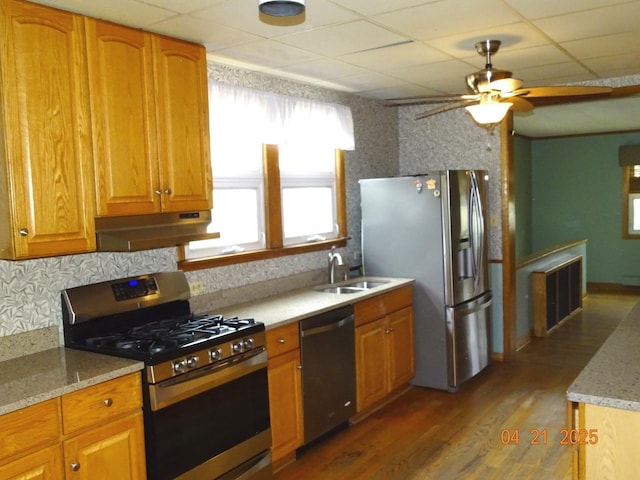 5837 N Navarre Ave, Chicago, IL 60631 - kitchen featuring appliances with stainless steel finishes, a sink, light wood-type flooring, ceiling fan, and wallpapered walls