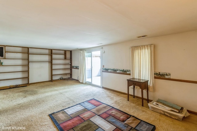 interior space featuring visible vents and carpet
