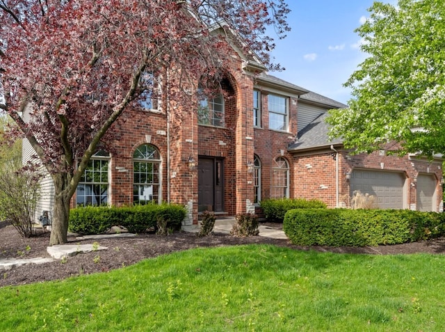 3035 Rollingridge Rd, Naperville, IL 60564 - traditional-style house with a garage, a shingled roof, a front lawn, and brick siding