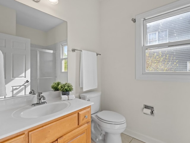 3035 Rollingridge Rd, Naperville, IL 60564 - full bathroom featuring tile patterned flooring, vanity, toilet, baseboards, and a stall shower