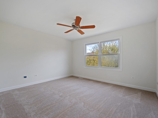 3035 Rollingridge Rd, Naperville, IL 60564 - empty room with a ceiling fan, baseboards, and carpet