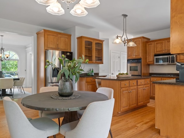 3035 Rollingridge Rd, Naperville, IL 60564 - kitchen featuring brown cabinets, stainless steel appliances, a chandelier, and glass insert cabinets