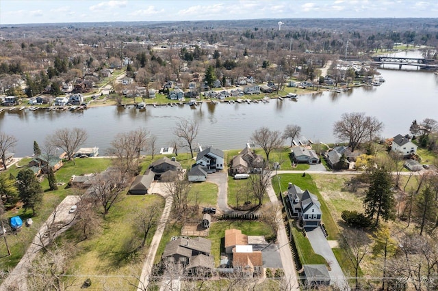 aerial view featuring a residential view and a water view