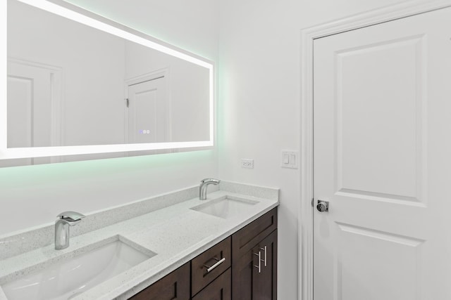 6460 S Kenwood Ave, Chicago, IL 60637 - full bathroom featuring double vanity and a sink