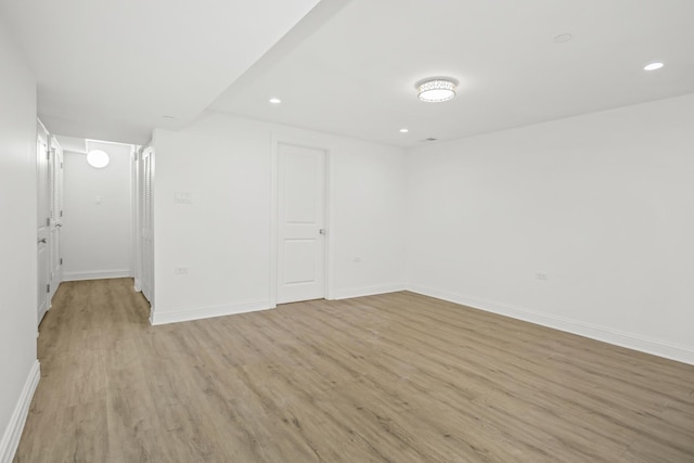 6460 S Kenwood Ave, Chicago, IL 60637 - basement featuring baseboards, light wood-type flooring, and recessed lighting