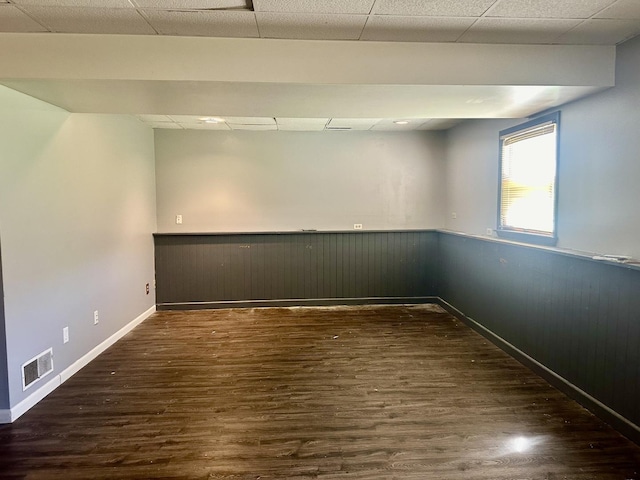 748 Marcy St, Ottawa, IL 61350 - basement featuring dark wood-type flooring, visible vents, baseboards, and wainscoting