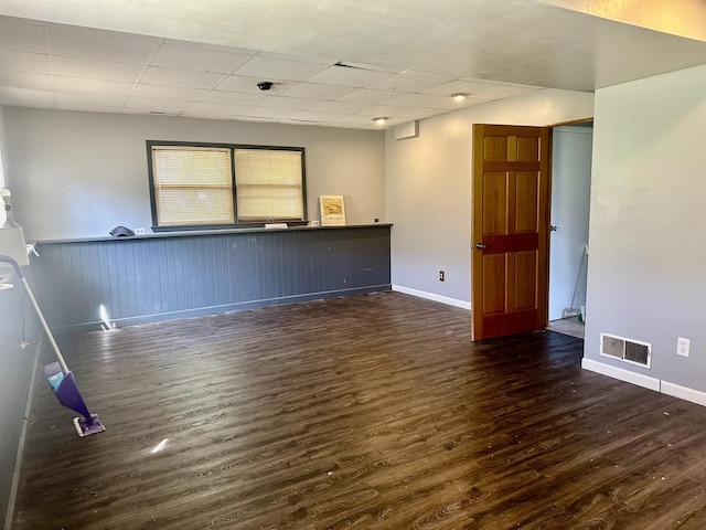 748 Marcy St, Ottawa, IL 61350 - spare room with wood finished floors, visible vents, a drop ceiling, and baseboards