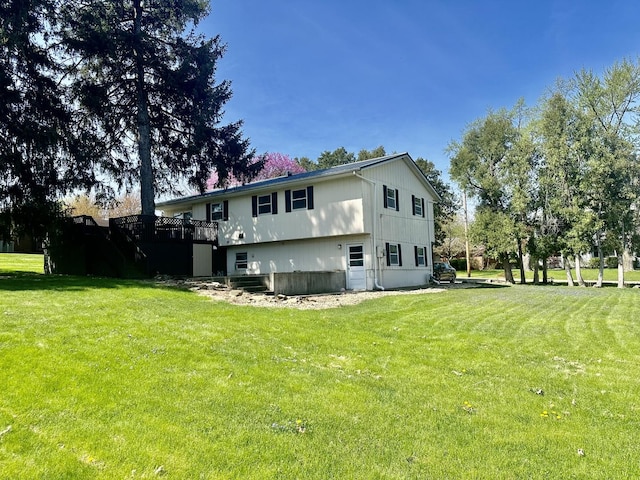 748 Marcy St, Ottawa, IL 61350 - back of property with a lawn and a deck
