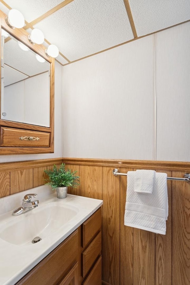 bathroom featuring vanity and a textured ceiling