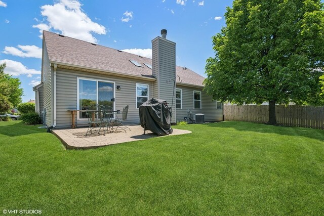 184 Stillwater Dr, Hainesville, IL 60030 - rear view of property with a chimney, a patio, a shingled roof, and central AC unit
