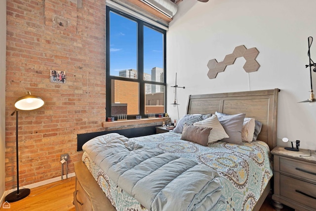bedroom featuring wood finished floors