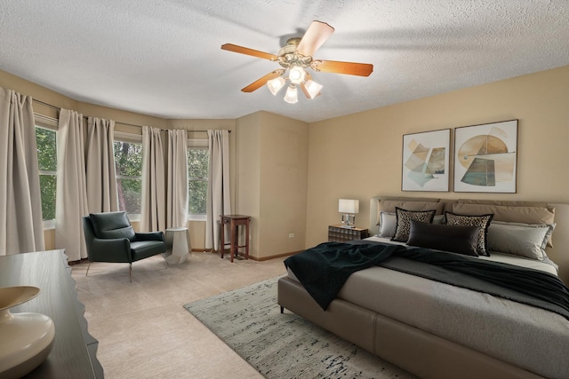 4232 Caribou Ct, Joliet, IL 60431 - carpeted bedroom with a textured ceiling and ceiling fan