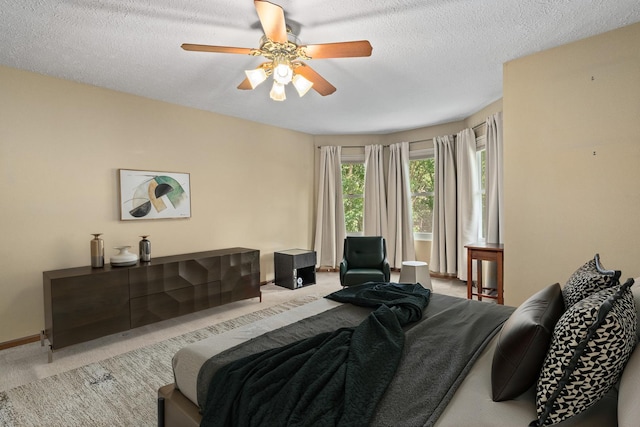 4232 Caribou Ct, Joliet, IL 60431 - carpeted bedroom featuring a textured ceiling and a ceiling fan