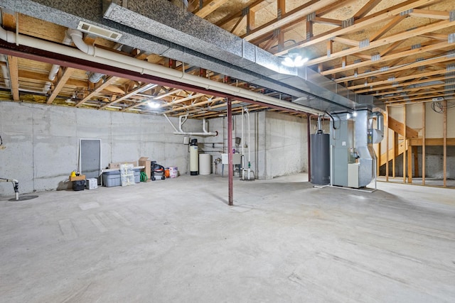 4232 Caribou Ct, Joliet, IL 60431 - unfinished below grade area featuring gas water heater, heating unit, and a water softener system