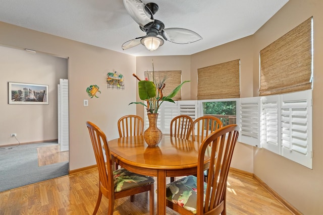 4232 Caribou Ct, Joliet, IL 60431 - dining area featuring a ceiling fan and light wood-style floors