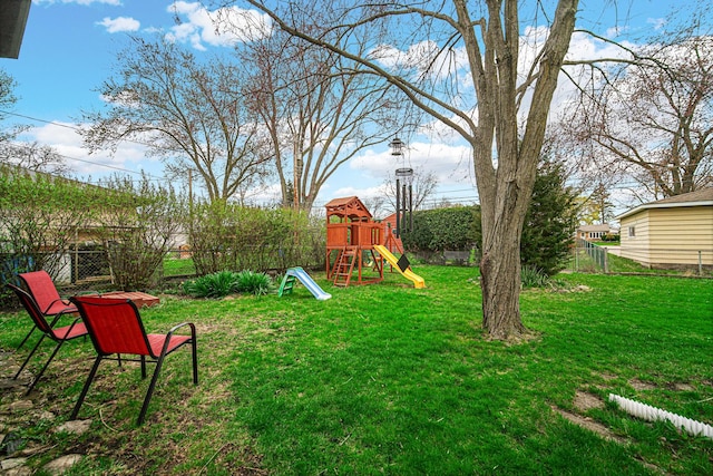1202 S Birch Dr, Mount Prospect, IL 60056 - view of yard with a playground and a fenced backyard