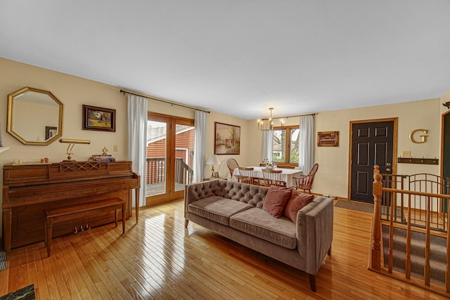 1202 S Birch Dr, Mount Prospect, IL 60056 - living room with light wood finished floors and a chandelier