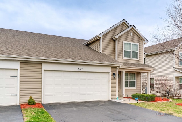 267 Maryland Ln, Pingree Grove, IL 60140 - view of front of house with a shingled roof, aphalt driveway, and a garage
