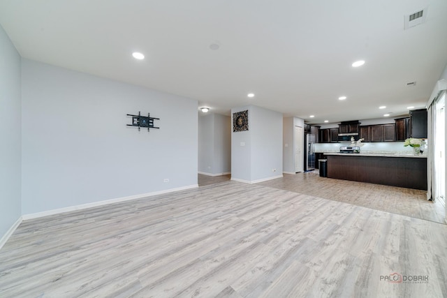 267 Maryland Ln, Pingree Grove, IL 60140 - unfurnished living room featuring recessed lighting, light wood-type flooring, visible vents, and baseboards