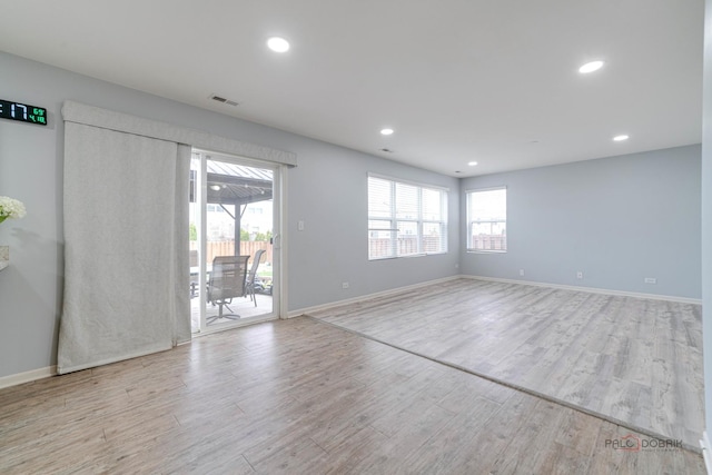 267 Maryland Ln, Pingree Grove, IL 60140 - unfurnished room featuring recessed lighting, wood finished floors, a wealth of natural light, and baseboards