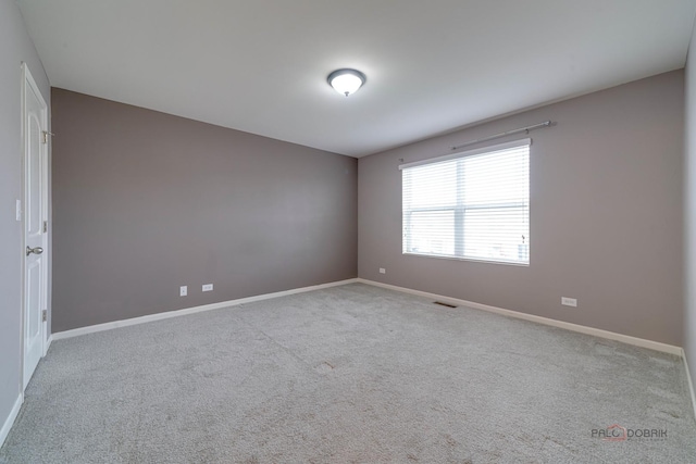 267 Maryland Ln, Pingree Grove, IL 60140 - spare room with baseboards, carpet flooring, and visible vents