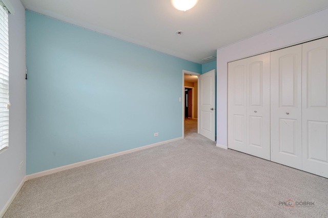 267 Maryland Ln, Pingree Grove, IL 60140 - unfurnished bedroom featuring carpet flooring, baseboards, and multiple windows