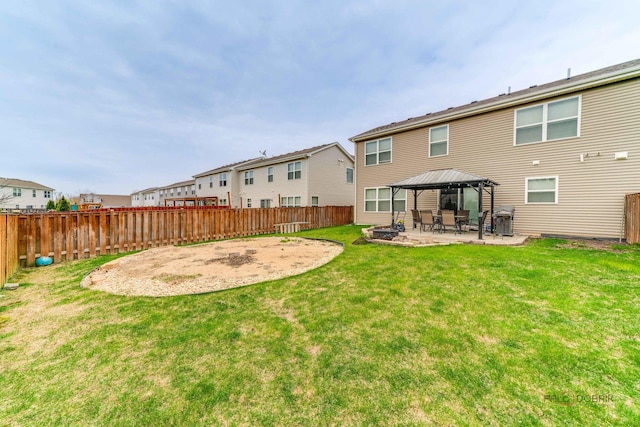 267 Maryland Ln, Pingree Grove, IL 60140 - back of property with a yard, a gazebo, a patio area, and a fenced backyard