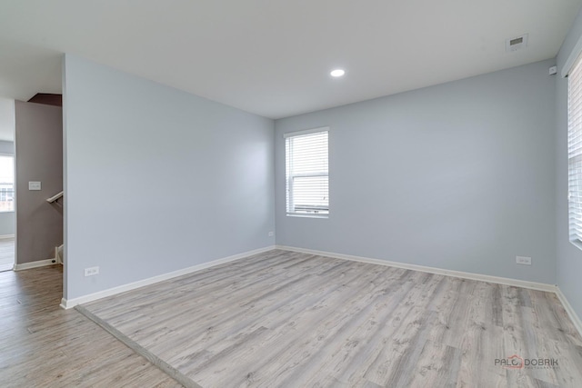 267 Maryland Ln, Pingree Grove, IL 60140 - spare room with recessed lighting, light wood-type flooring, visible vents, and baseboards