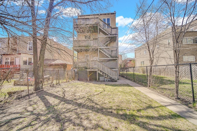 6547 S Woodlawn Ave Unit 2, Chicago, IL 60637 - view of yard featuring stairway and fence private yard