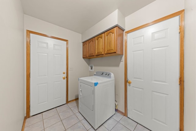 2398 S Williamsburg Dr, Plainfield, IL 60586 - laundry room with washer / dryer, cabinet space, and light tile patterned flooring