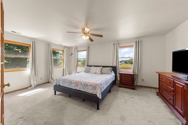 2398 S Williamsburg Dr, Plainfield, IL 60586 - bedroom featuring light carpet and a ceiling fan