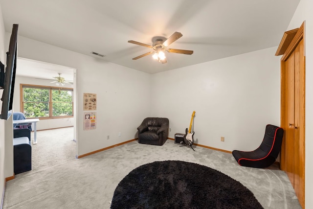 2398 S Williamsburg Dr, Plainfield, IL 60586 - sitting room with carpet flooring and ceiling fan