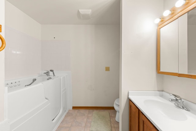 2398 S Williamsburg Dr, Plainfield, IL 60586 - full bathroom with vanity, a bath, and tile patterned flooring