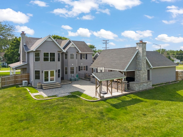2398 S Williamsburg Dr, Plainfield, IL 60586 - rear view of property featuring a patio area and a chimney