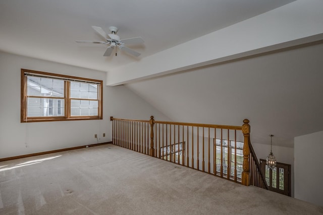 bonus room with baseboards, ceiling fan, carpet, and vaulted ceiling