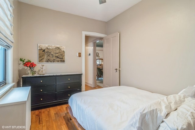 bedroom with light wood finished floors