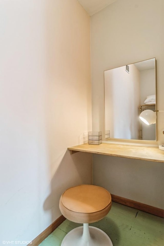 bathroom with toilet, baseboards, and visible vents