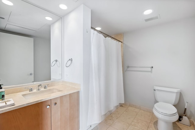bathroom featuring visible vents, vanity, toilet, baseboards, and a shower with curtain