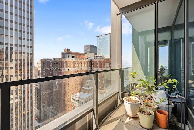 balcony featuring a city view