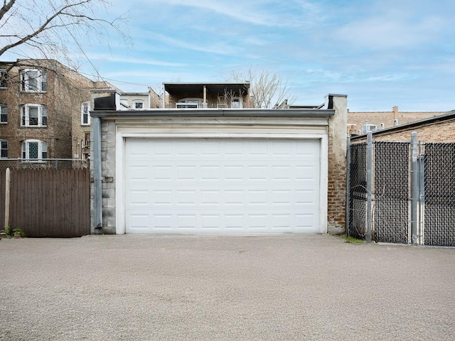 garage featuring fence