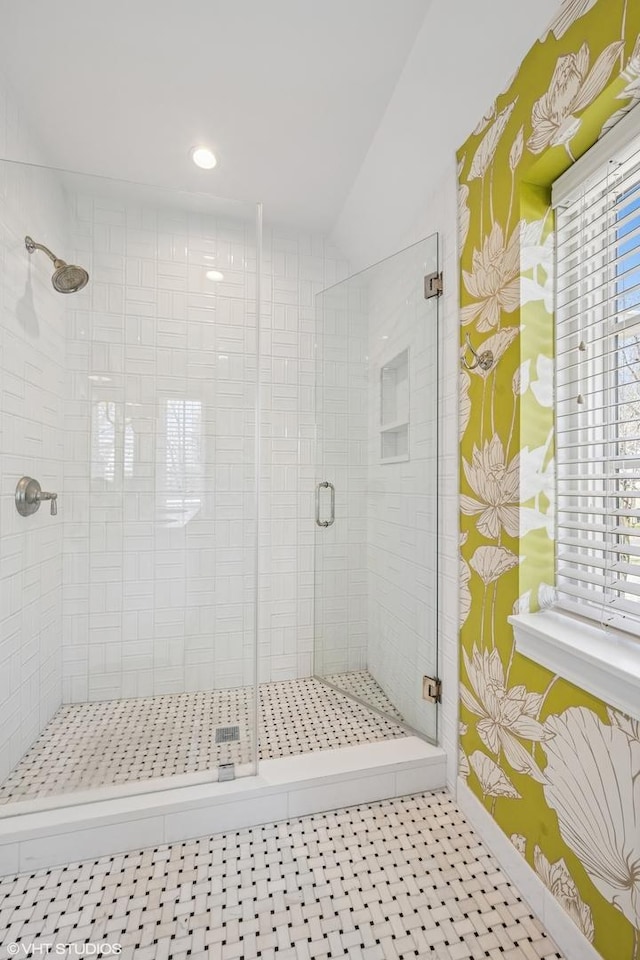 bathroom with recessed lighting and a stall shower