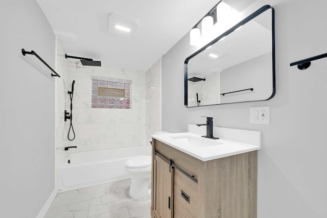 bathroom with washtub / shower combination, marble finish floor, toilet, vanity, and baseboards
