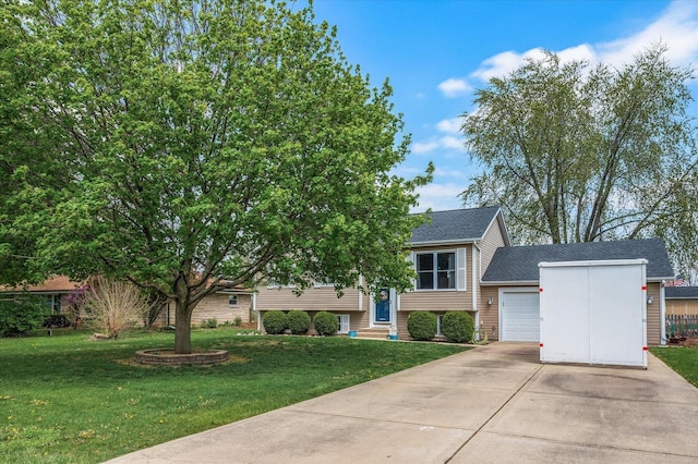 view of front of home with an attached garage, driveway, a shingled roof, and a front lawn
